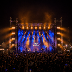 Em palco